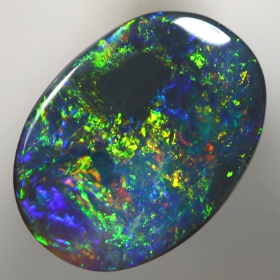 SOLID BLACK OPAL Copper fire contrasts with crisp green and blue